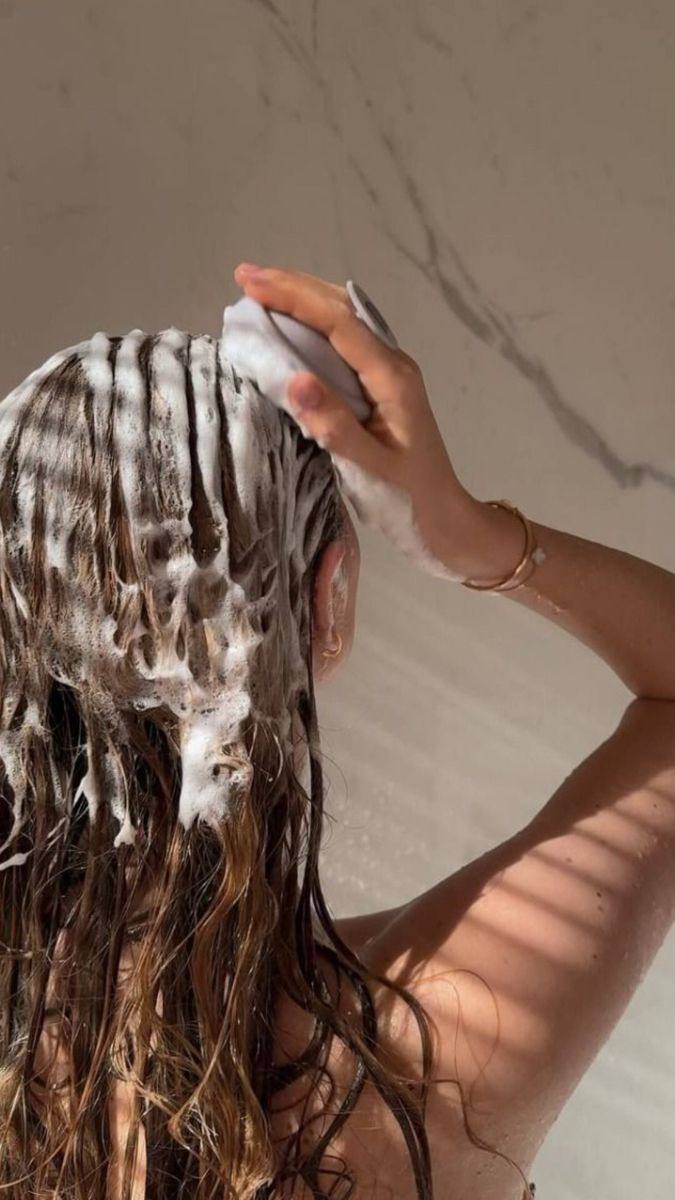 Як зупинити  випадіння волосся